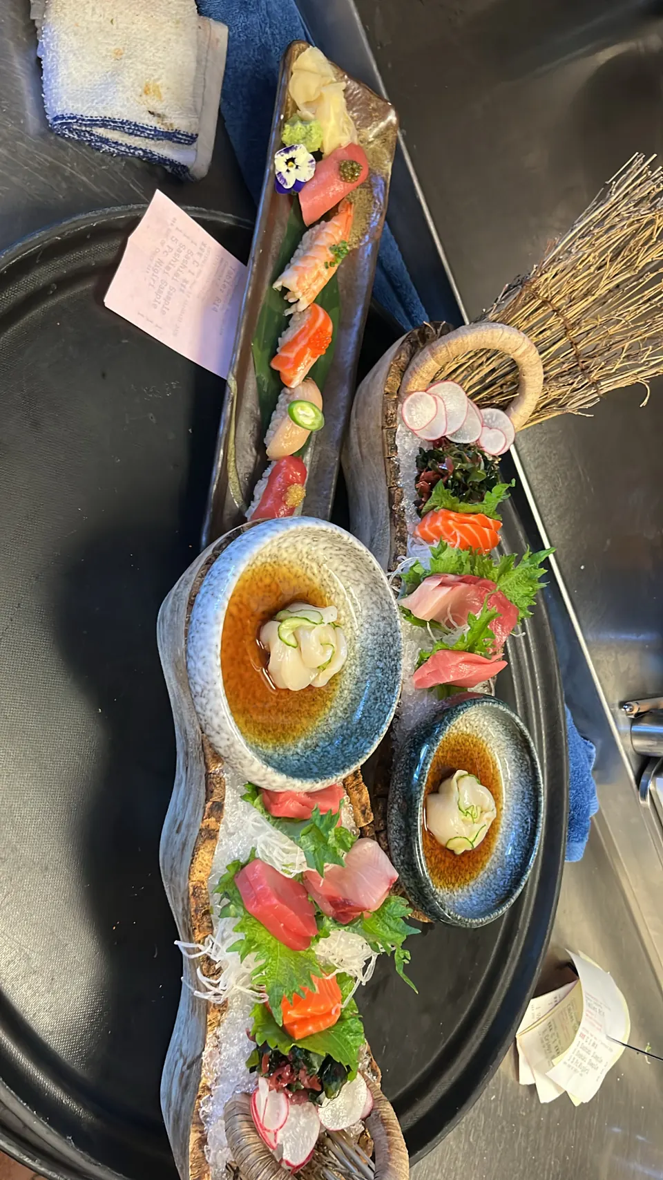 A sushi and sashimi spread catered by Mica